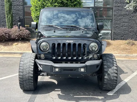 Another view of 2012 Jeep Wrangler Unlimited Sport for sale in Sandy Springs, GA at Gravity Autos Sandy Springs