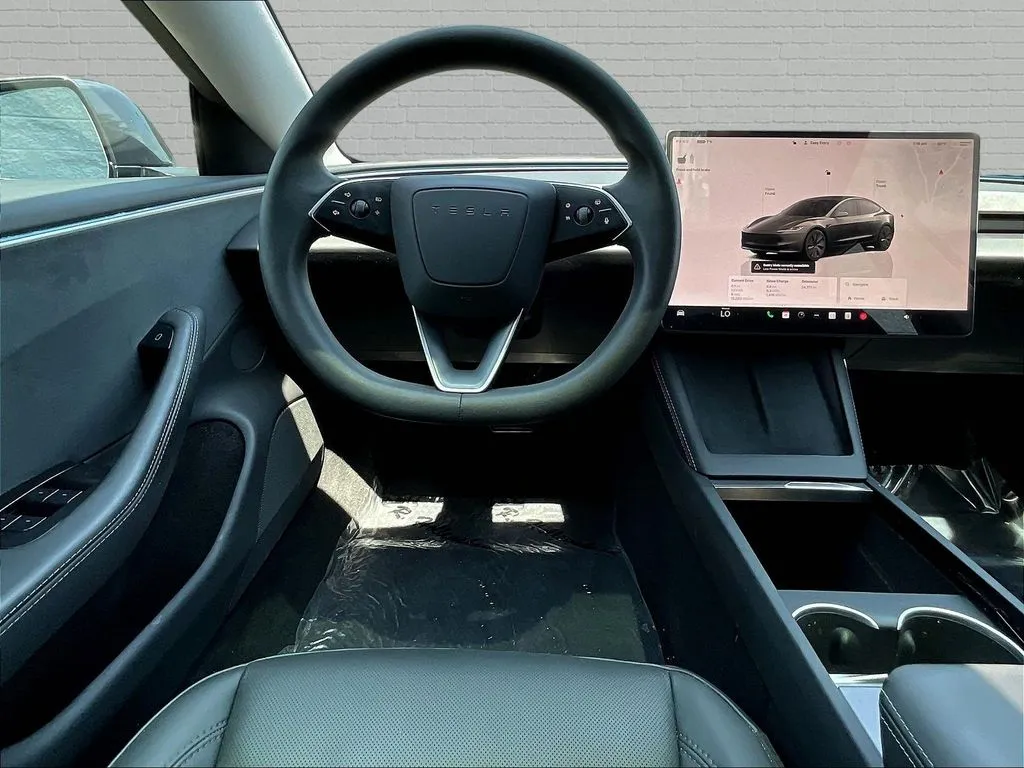 Tesla Model 3 photo 7