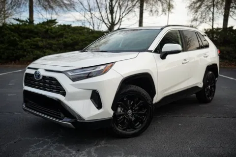 Green 2022 Toyota RAV4 Hybrid SE for sale in Duluth, GA