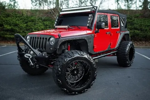 Red 2014 Jeep Wrangler Unlimited Sport for sale in Duluth, GA
