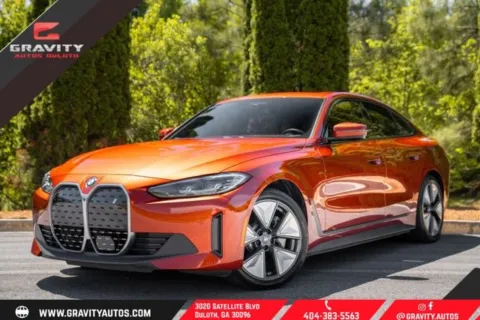 Orange 2023 BMW i4 eDrive35 for sale in Duluth, GA