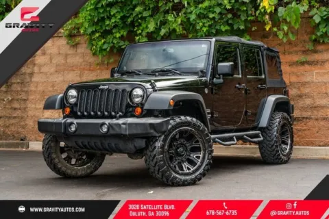 Black 2013 Jeep Wrangler Unlimited Sport for sale in Duluth, GA