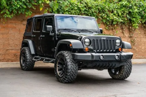 Another view of 2013 Jeep Wrangler Unlimited Sport for sale in Duluth, GA at Gravity Autos Duluth