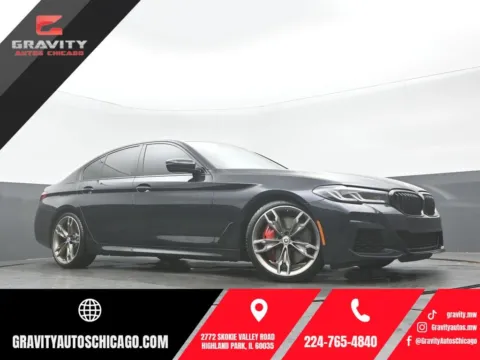 Black 2023 BMW 5 Series M550i xDrive for sale in Highland Park, IL