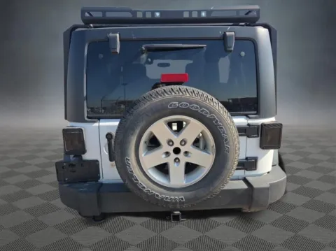 Another view of 2014 Jeep Wrangler Unlimited Sport for sale in Colorado Springs, CO at McCloskey Imports & 4x4s (Licensed as McCloskey Isuzu)