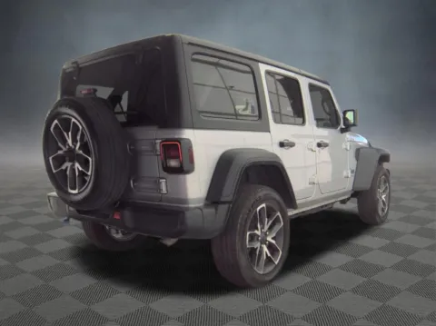 Photos of 2024 Jeep Wrangler Sport S 4xe for sale in Colorado Springs, CO at McCloskey Imports & 4x4s (Licensed as McCloskey Isuzu)