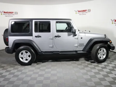 Photos of 2014 Jeep Wrangler Unlimited Sport for sale in Colorado Springs, CO at McCloskey Imports & 4x4s (Licensed as McCloskey Isuzu)