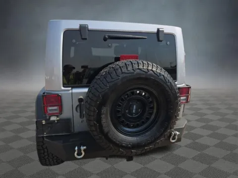 Photos of 2014 Jeep Wrangler Unlimited Sahara for sale in Colorado Springs, CO at McCloskey Imports & 4x4s (Licensed as McCloskey Isuzu)