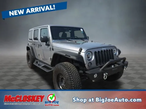 Silver 2014 Jeep Wrangler Unlimited Sahara for sale in Colorado Springs, CO