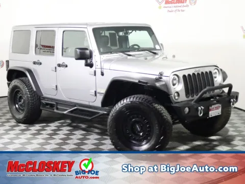 Silver 2014 Jeep Wrangler Unlimited Sahara for sale in Colorado Springs, CO
