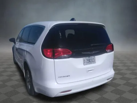 Photos of 2023 Chrysler Voyager LX for sale in Colorado Springs, CO at McCloskey Imports & 4x4s (Licensed as McCloskey Isuzu)
