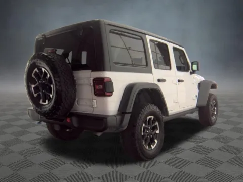 More photos of 2024 Jeep Wrangler Rubicon 4xe at McCloskey Imports & 4x4s (Licensed as McCloskey Isuzu), CO
