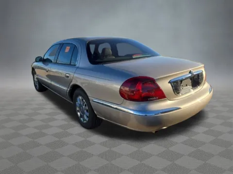 Photos of 2002 Lincoln Continental for sale in Colorado Springs, CO at McCloskey Imports & 4x4s (Licensed as McCloskey Isuzu)
