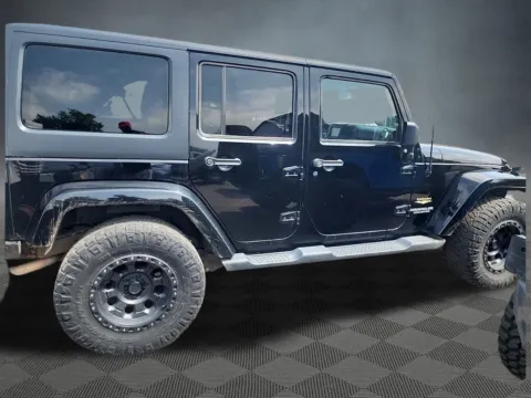 More photos of 2011 Jeep Wrangler Unlimited Sahara at McCloskey Imports & 4x4s, CO
