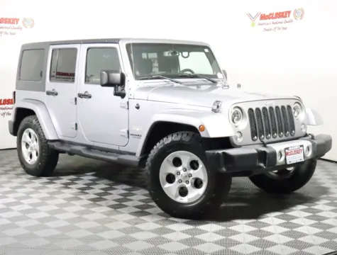Another view of 2014 Jeep Wrangler Unlimited Sahara for sale in Colorado Springs, CO at McCloskey Isuzu