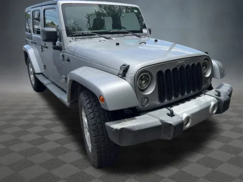 Photos of 2014 Jeep Wrangler Unlimited Sahara for sale in Colorado Springs, CO at McCloskey Imports & 4x4s