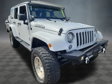 Photos of 2017 Jeep Wrangler Unlimited Sahara for sale in Colorado Springs, CO at McCloskey Isuzu