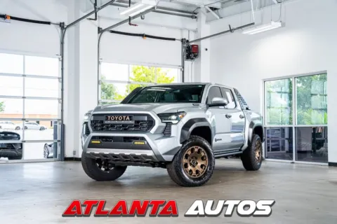 Silver 2024 Toyota Tacoma Hybrid Trailhunter for sale in Marietta, GA
