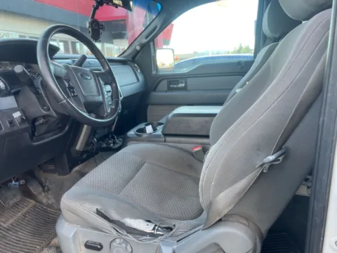 Another view of 2014 Ford F-150 XLT for sale in Colorado Springs, CO at McCloskey Truck Town (Licensed as McCloskey Motors Inc.)