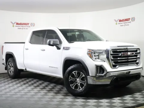 Photos of 2021 GMC Sierra 1500 SLT for sale in Colorado Springs, CO at McCloskey Truck Town (Licensed as McCloskey Motors Inc.)