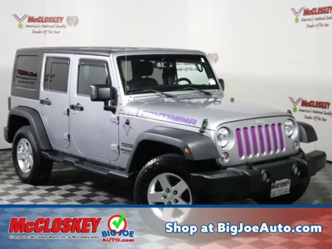 Silver 2014 Jeep Wrangler Unlimited Sport for sale in Colorado Springs, CO