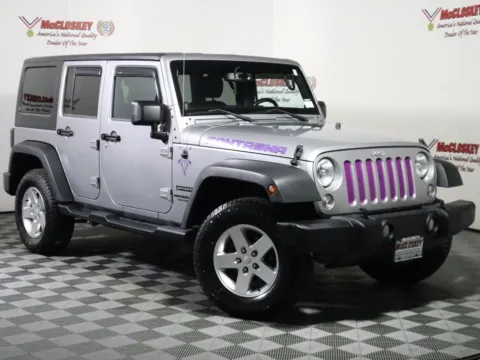 Photos of 2014 Jeep Wrangler Unlimited Sport for sale in Colorado Springs, CO at McCloskey Truck Town (Licensed as McCloskey Motors Inc.)