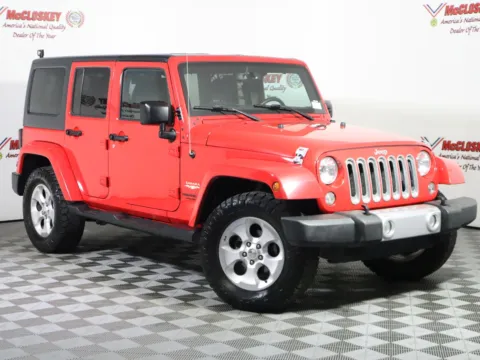 Photos of 2015 Jeep Wrangler Unlimited Sahara for sale in Colorado Springs, CO at McCloskey Truck Town (Licensed as McCloskey Motors Inc.)