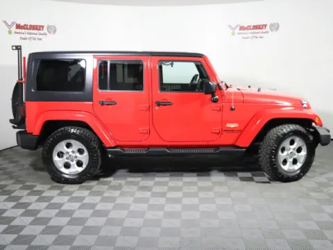 Another view of 2015 Jeep Wrangler Unlimited Sahara for sale in Colorado Springs, CO at McCloskey Truck Town (Licensed as McCloskey Motors Inc.)