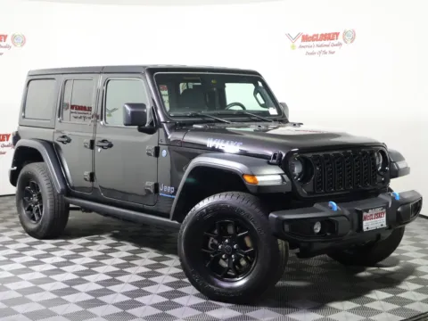 Photos of 2015 Jeep Wrangler Unlimited Sahara for sale in Colorado Springs, CO at McCloskey Truck Town (Licensed as McCloskey Motors Inc.)