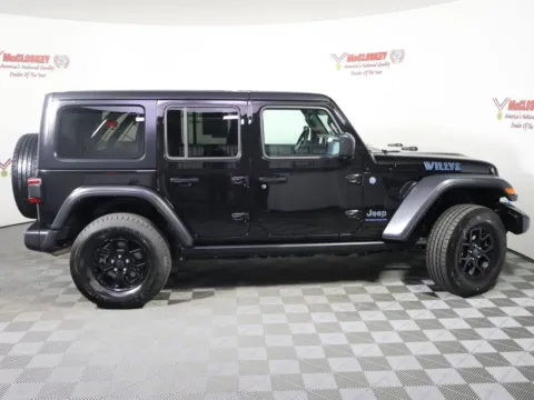 Another view of 2015 Jeep Wrangler Unlimited Sahara for sale in Colorado Springs, CO at McCloskey Truck Town (Licensed as McCloskey Motors Inc.)