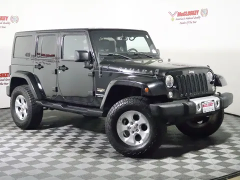 Photos of 2015 Jeep Wrangler Unlimited Sahara for sale in Colorado Springs, CO at McCloskey Truck Town (Licensed as McCloskey Motors Inc.)