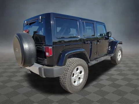 Photos of 2015 Jeep Wrangler Unlimited Sahara for sale in Colorado Springs, CO at McCloskey Truck Town (Licensed as McCloskey Motors Inc.)