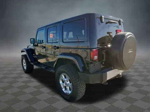 Another view of 2015 Jeep Wrangler Unlimited Sahara for sale in Colorado Springs, CO at McCloskey Truck Town (Licensed as McCloskey Motors Inc.)