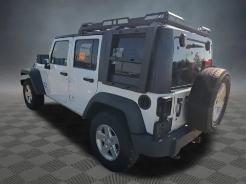 Photos of 2014 Jeep Wrangler Unlimited Sport for sale in Colorado Springs, CO at McCloskey Truck Town (Licensed as McCloskey Motors Inc.)
