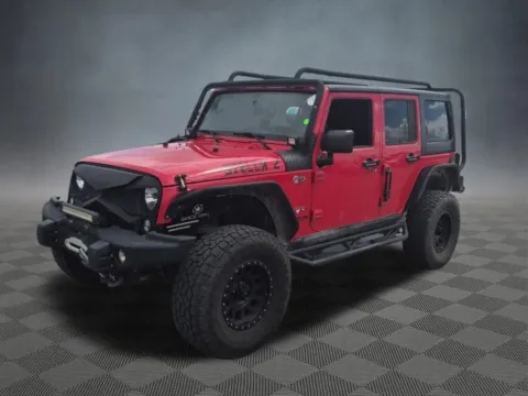 Another view of 2016 Jeep Wrangler Unlimited Sahara for sale in Colorado Springs, CO at McCloskey Truck Town (Licensed as McCloskey Motors Inc.)