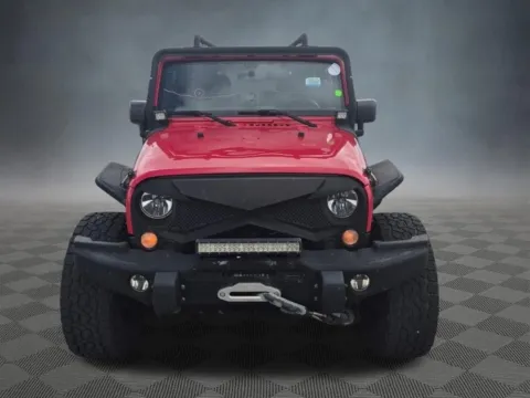 Photos of 2016 Jeep Wrangler Unlimited Sahara for sale in Colorado Springs, CO at McCloskey Truck Town (Licensed as McCloskey Motors Inc.)