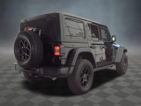 Photos of 2024 Jeep Wrangler Willys 4xe for sale in Colorado Springs, CO at McCloskey Truck Town (Licensed as McCloskey Motors Inc.)