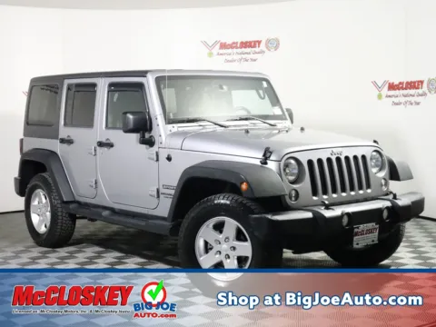 Silver 2014 Jeep Wrangler Unlimited Sport for sale in Colorado Springs, CO