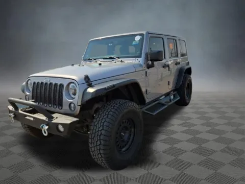 More photos of 2014 Jeep Wrangler Unlimited Sahara at McCloskey Truck Town (Licensed as McCloskey Motors Inc.), CO
