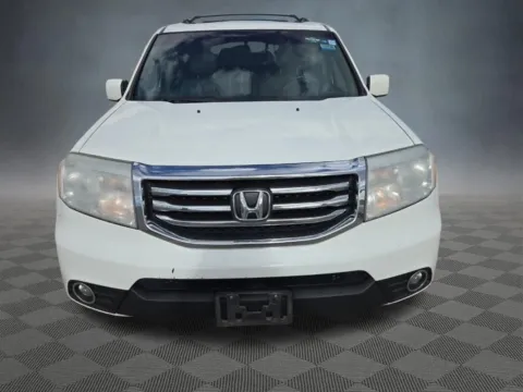 Photos of 2014 Honda Pilot EX-L for sale in Colorado Springs, CO at McCloskey Truck Town (Licensed as McCloskey Motors Inc.)