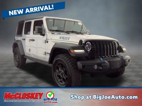 Silver 2023 Jeep Wrangler Willys 4xe for sale in Colorado Springs, CO