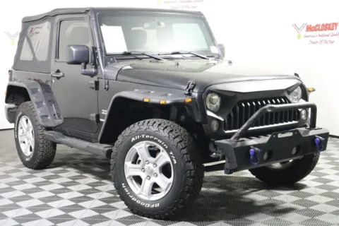 Photos of 2017 Jeep Wrangler Sahara for sale in Colorado Springs, CO at McCloskey Truck Town (Licensed as McCloskey Motors Inc.)