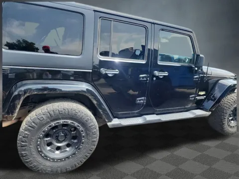 More photos of 2011 Jeep Wrangler Unlimited Sahara at McCloskey Truck Town, CO
