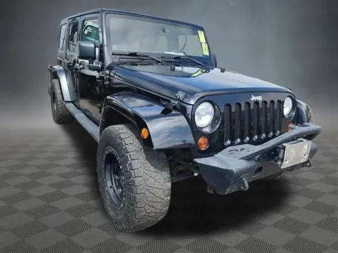 Photos of 2011 Jeep Wrangler Unlimited Sahara for sale in Colorado Springs, CO at McCloskey Truck Town