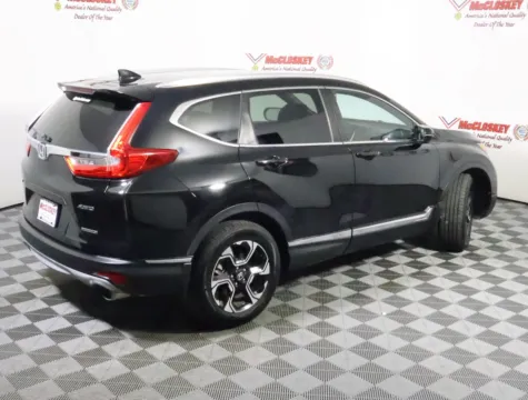 More photos of 2018 Honda CR-V Touring at McCloskey Truck Town, CO