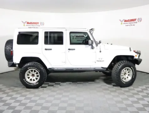 Another view of 2017 Jeep Wrangler Unlimited Sahara for sale in Colorado Springs, CO at McCloskey Motors, Inc.