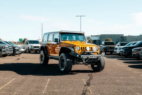 Brown 2014 Jeep Wrangler Unlimited Sport for sale in Albuquerque, NM