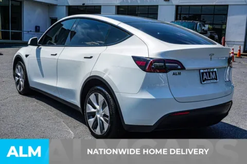 More photos of 2023 Tesla Model Y Long Range at ALM Nissan Newnan, GA