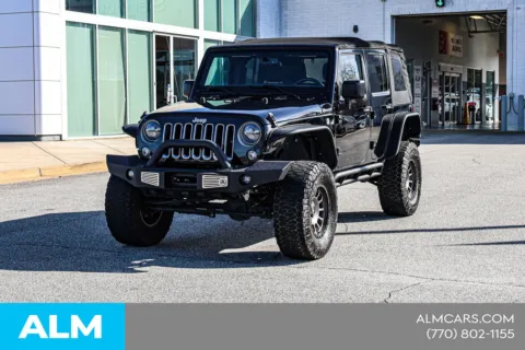 More photos of 2016 Jeep Wrangler Unlimited Sahara at ALM Nissan Newnan, GA