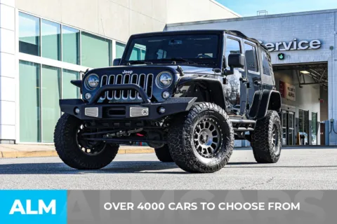 Another view of 2016 Jeep Wrangler Unlimited Sahara for sale in Newnan, GA at ALM Nissan Newnan